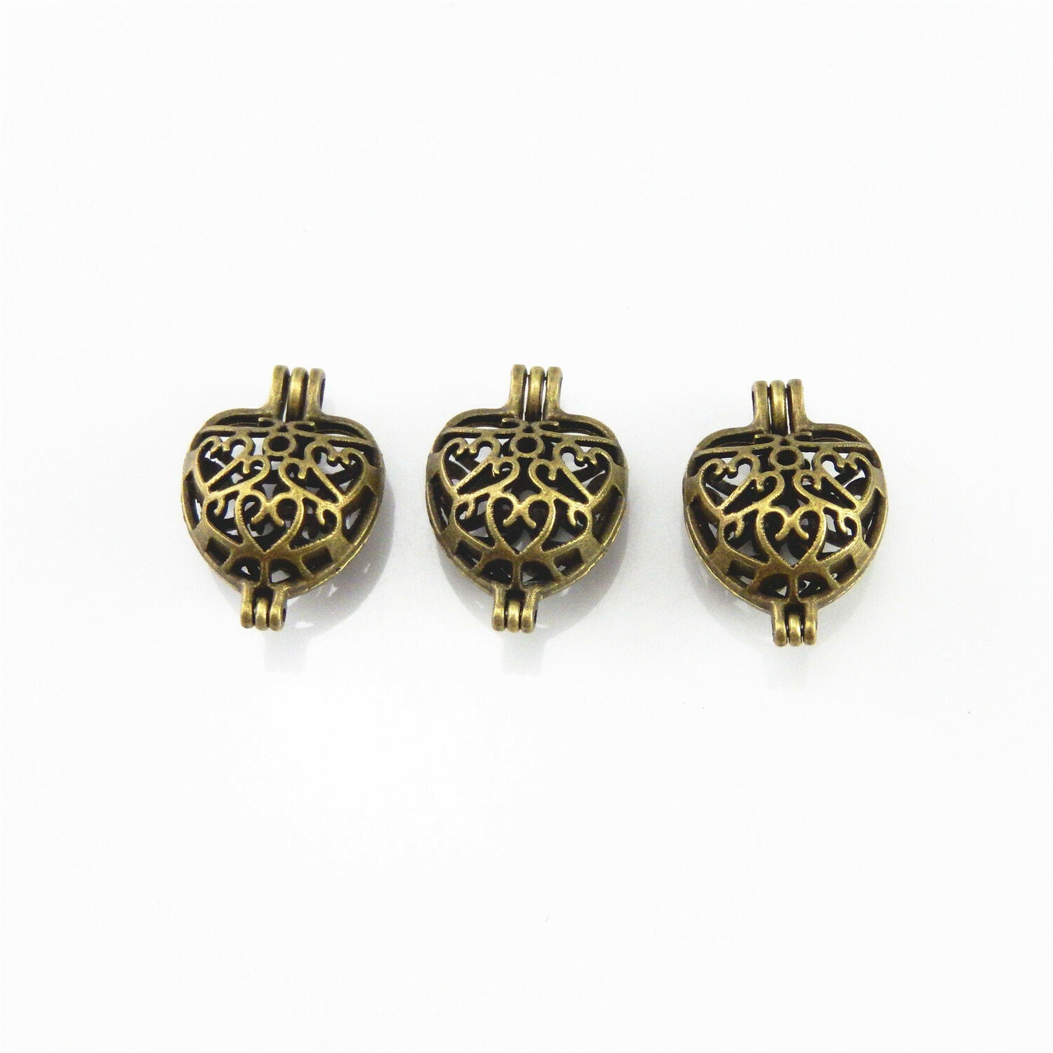 4 pcs Hollowed Bronze Alloy Mini Heart Shaped Locket Handmade Pendants Findings