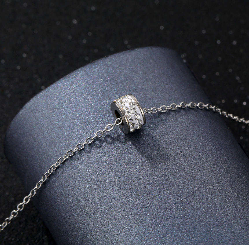 Rotate Spring Pave Cubic Zirconia Titanium White Ring Pendant Necklace