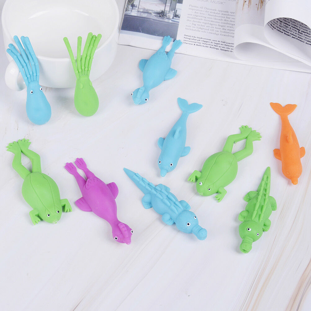 1Pc cute stretchy finger slingshot sticky flying marine animal kids to.l8