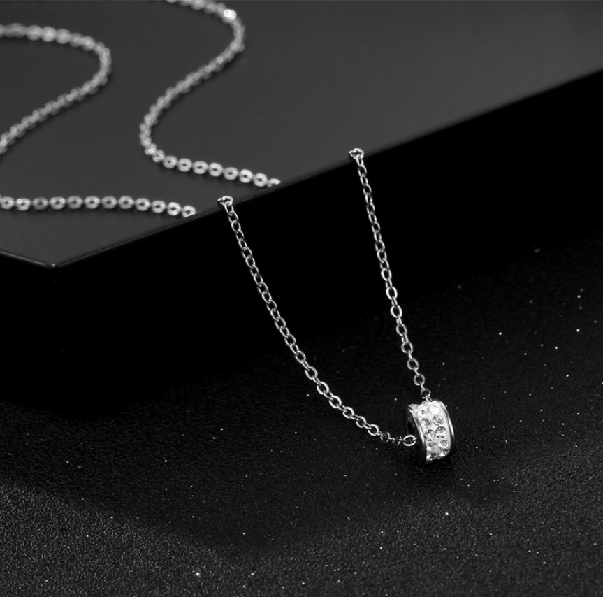 Rotate Spring Pave Cubic Zirconia Titanium White Ring Pendant Necklace