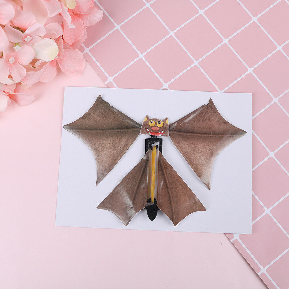 Magic flying bat prank flying paper bats funny halloween card gif.l8