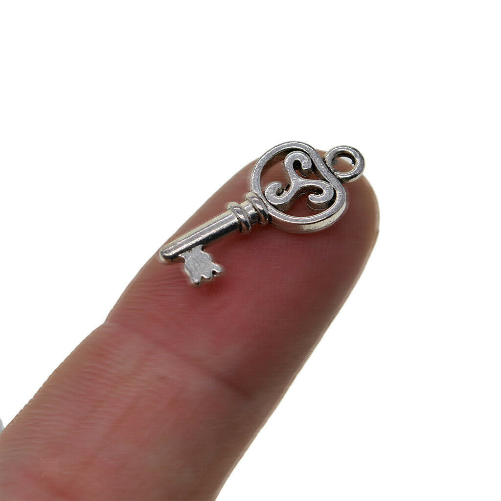 Prettyia 100x Old Style Mini Filigree Skeleton Key Charms Pendants 22x10mm