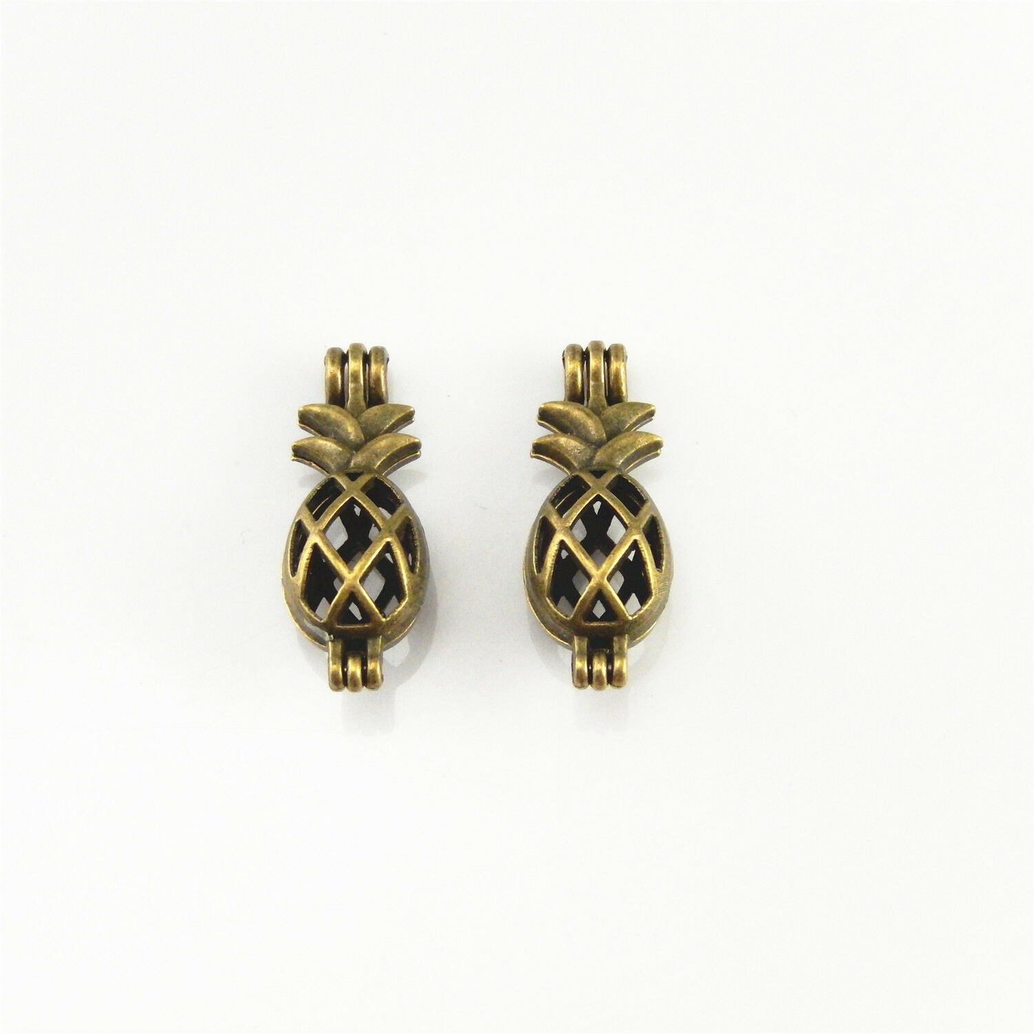 4 pcs Antiqued Bronze Alloy Hollow Pineapple Locket Oil Diffuser Charms Pendants