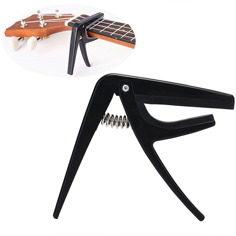 Professional Ukulele Capo Single-handed Quick Change Plastic Steel Access.l8