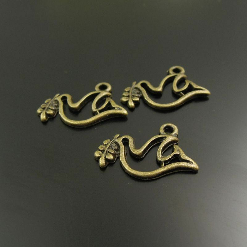 100 pcs Antiqued Bronze Alloy Peace Dove Bird Charm Pendant Art Crafting 17x10mm