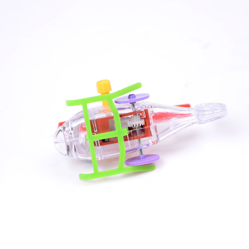 1x Mini Clockwork Transparent Aircraft Somersault Running Wind Up To.l8