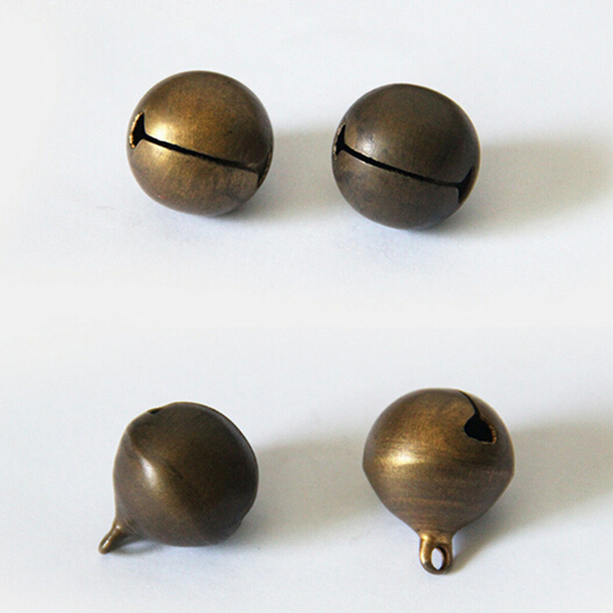 100Pcs Bronze Metal Christmas Jingle Bells Pendants Charms Craft Beads 6mm