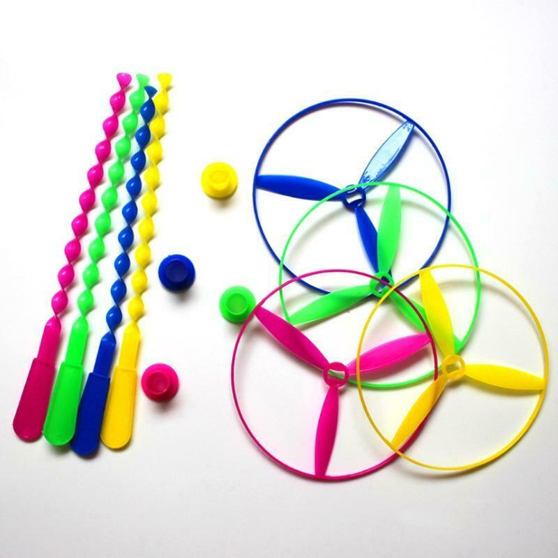 Package of 12 Twisty Flying Saucers Assorted Colors Helicopters Kids Toys Gifts
