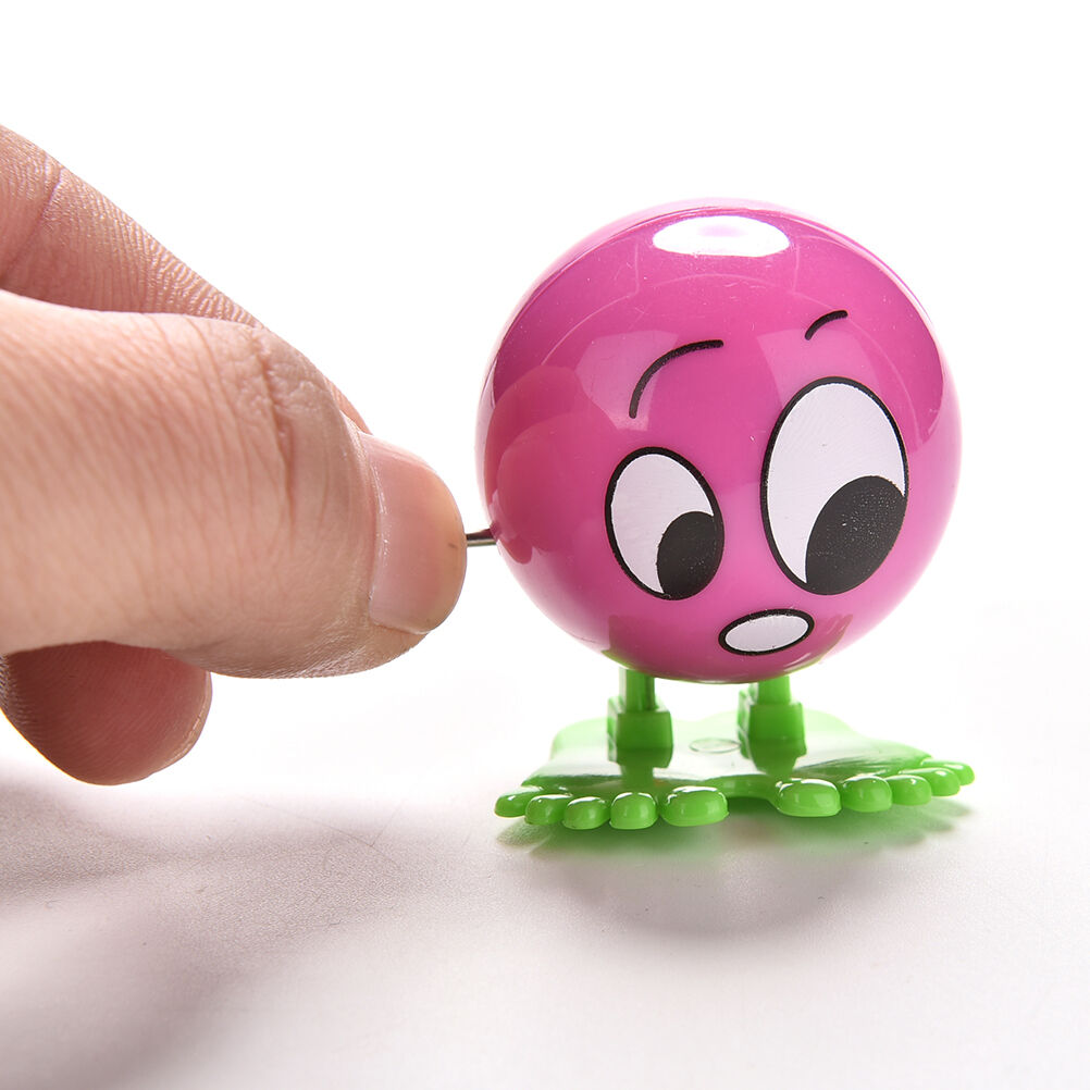 1Pc Wind up Face Colorful Funny  Cartoon Somersault Running Clockwork  To.l8