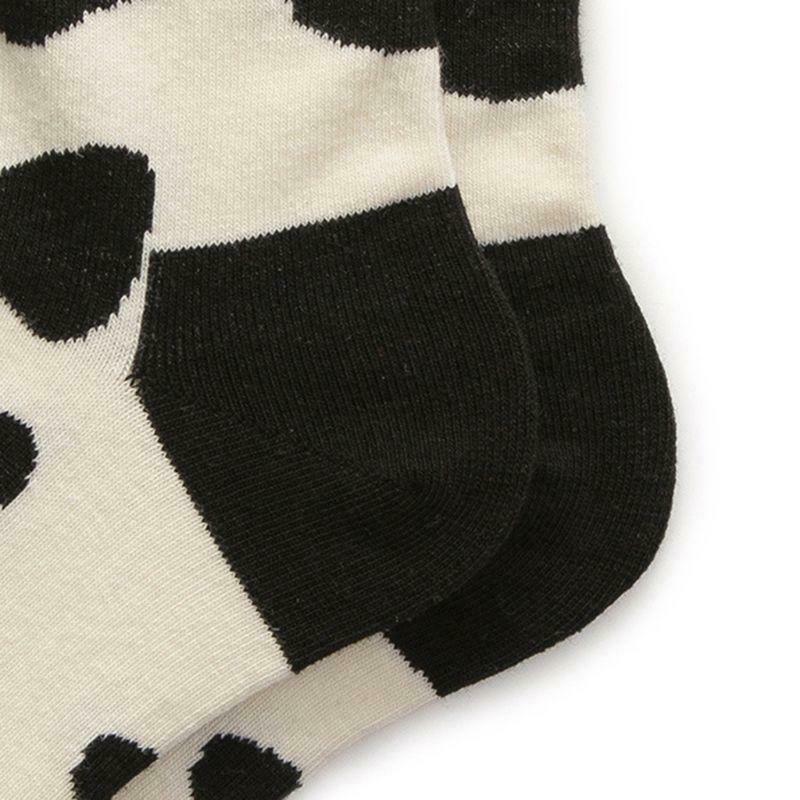 Unisex Funny Crew Socks Black White Milk Cow Print Skateboard Mid Tube Hosiery