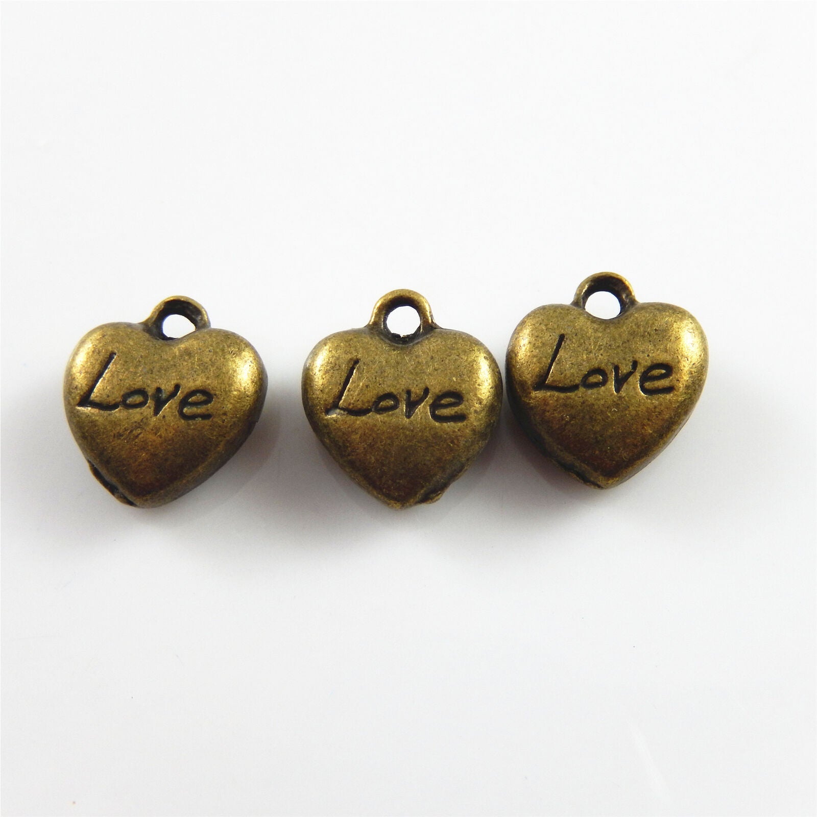 35 pcs Antiqued Bronze Mini Heart Shaped Charm "Love" Engraved Pendant Findings