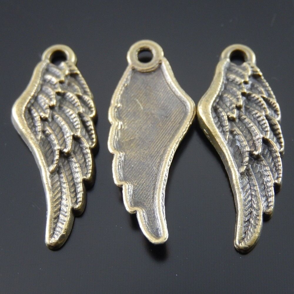 Antiqued Bronze Tone Angel Wing Shaped Alloy Charm Pendant 27*10mm 50pcs