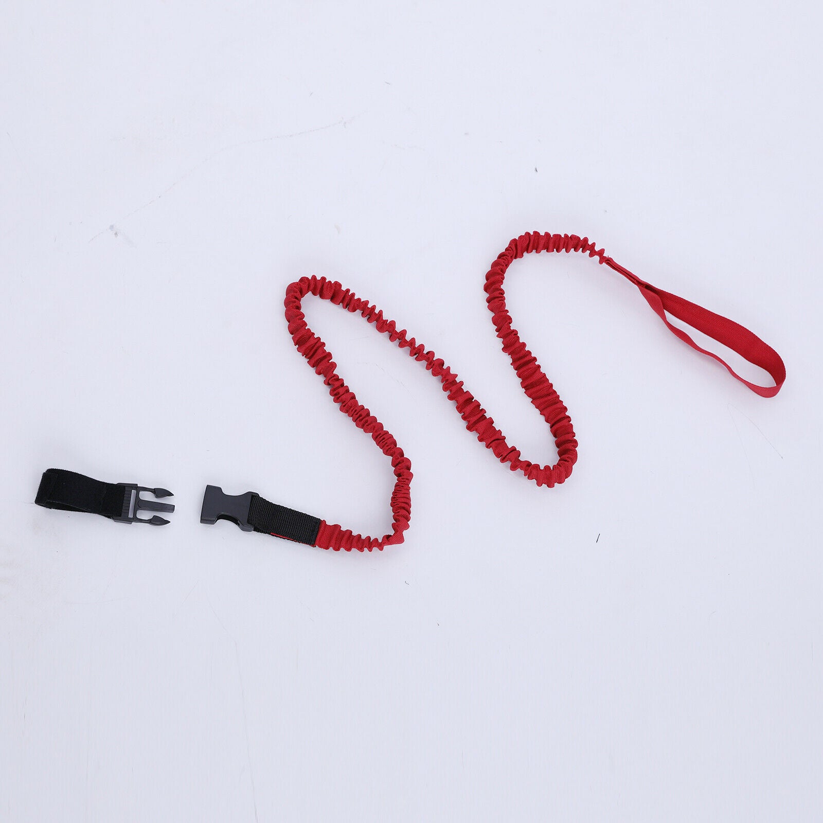 Durable kayak paddle line. Coiled bungee fishing rod holder