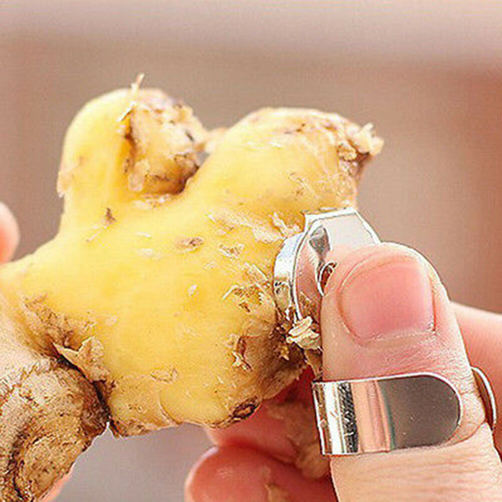 2pcsPractical Stainless Steel Kitchen Gadget Garlic Ginger Cutter Peeler T.l8