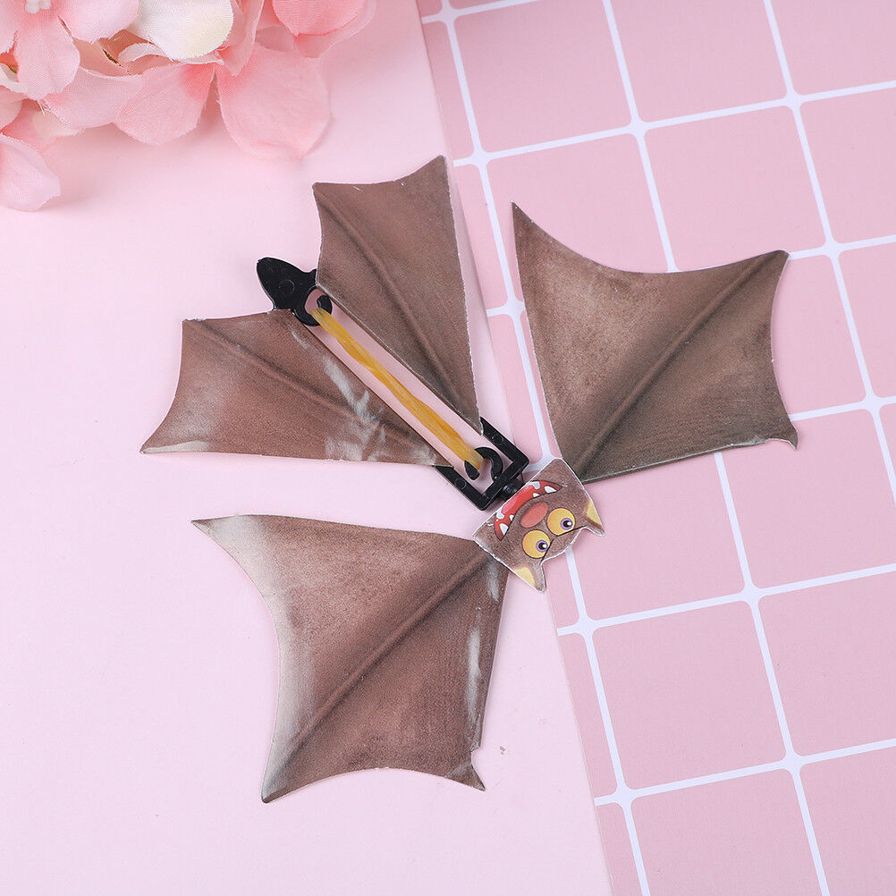 Magic flying bat prank flying paper bats funny halloween card gif.l8