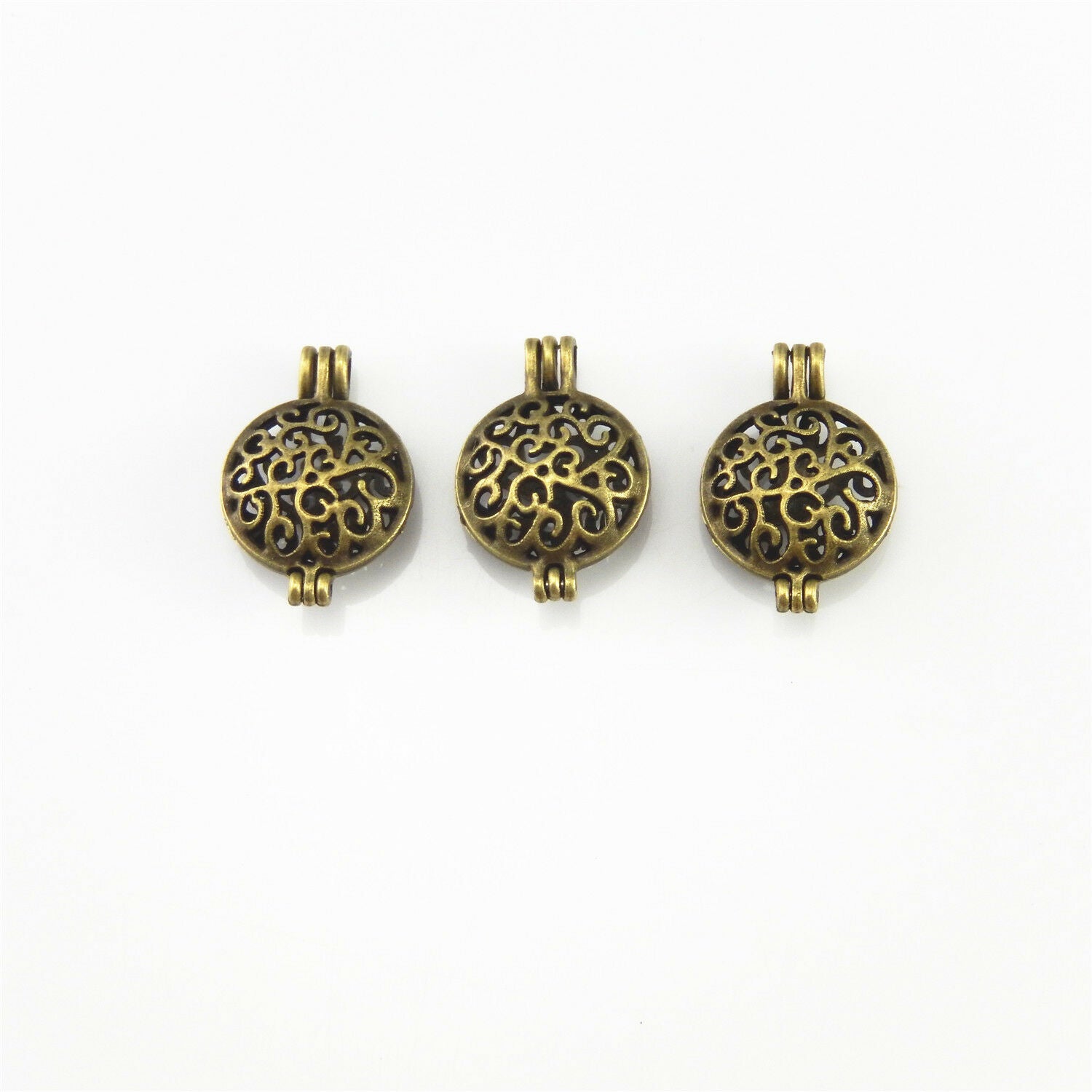 4 PCS Antiqued Bronze Alloy Round Hollow Locket Oil Diffuser Charms Pendants